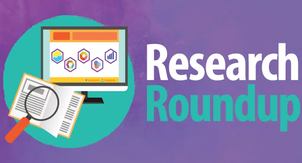 Illustration of a computer monitor displaying research icons, an open book with a magnifying glass, and the words "Research Roundup" on a purple and teal background.