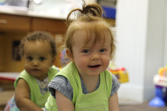 children-wearing-lena-vests-smiling-in-classroom