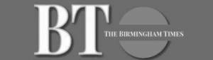 Logo for The Birmingham Times with large, bold letters "BT" on the left and "THE BIRMINGHAM TIMES" written inside a gray circle on the right, all on a gray background.