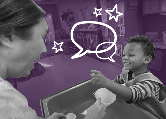 preschooler and teacher smiling and talking at a water table