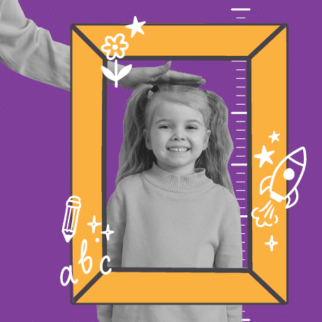 A smiling young girl stands inside a large illustrated frame with school-themed doodles, while an adult measures her height by placing a hand on her head. The background is purple.
