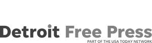 Logo for the Detroit Free Press, part of the USA Today Network, with "Detroit" in bold black text and "Free Press" in lighter gray text.