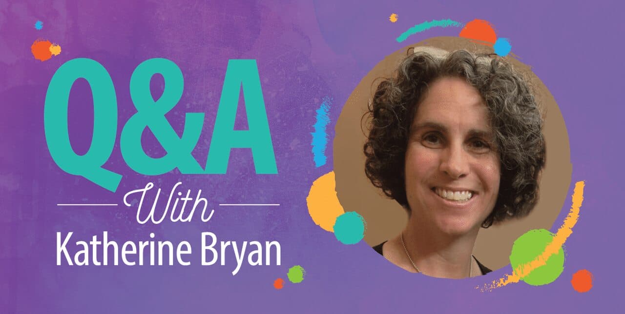Q&A with Katherine Bryan text on a colorful purple background, featuring a smiling woman with short curly hair in a circular photo on the right.