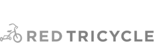 Logo with a white outline of a tricycle on the left, followed by the words "RED TRICYCLE" in bold, white, uppercase letters on a transparent background.