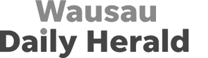 Logo with the words "Wausau Daily Herald" in bold, gray and black text on a white background.