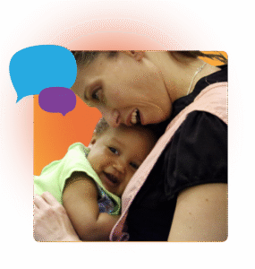 A smiling adult holding a happy baby close, both facing the camera. Two colorful speech bubbles are shown in the upper left. The background is a warm orange gradient.