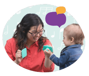 A woman and a toddler smile at each other, holding textured shapes. The background’s music notes and speech bubbles highlight the role of music and early literacy in communication and playful learning.