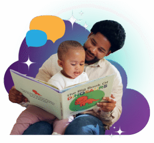 A smiling man sits with a young child on his lap, reading "The Big Book of Dinosaurs" together. Colorful shapes and sparkles decorate the background.