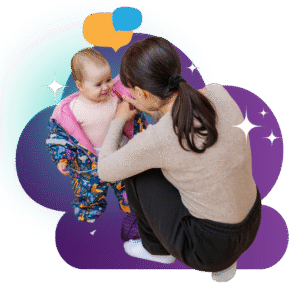 An adult kneels to help a smiling baby put on a colorful snowsuit, with speech bubbles and purple graphic shapes in the background.